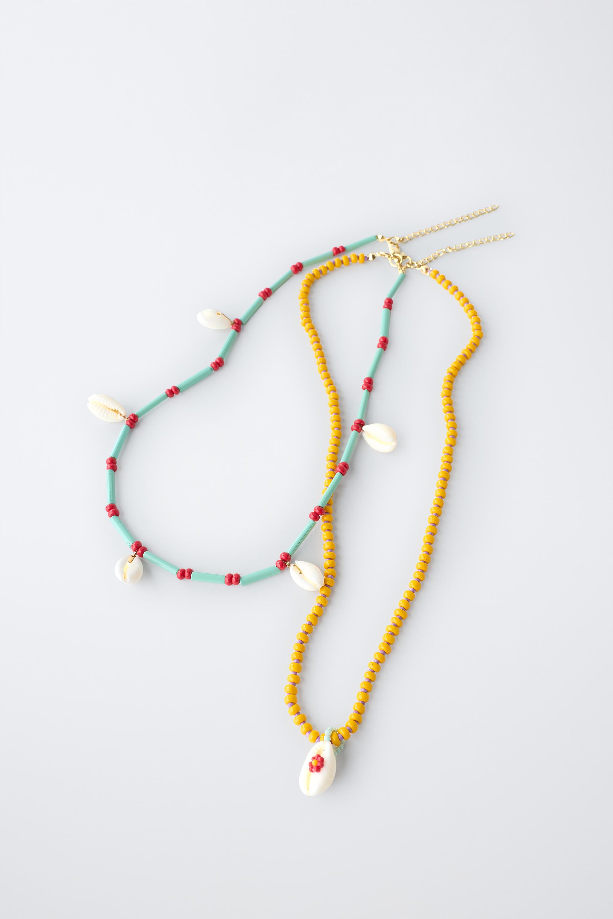 PACK OF TWO BEADED SHELL NECKLACES